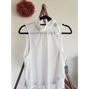 White sleeveless top with back neck tie